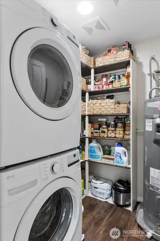 a close view of a utility room with washer and dryer