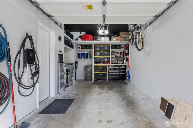 a view of a storage & utility room with racks shoes