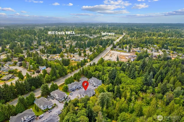 a view of city and green space