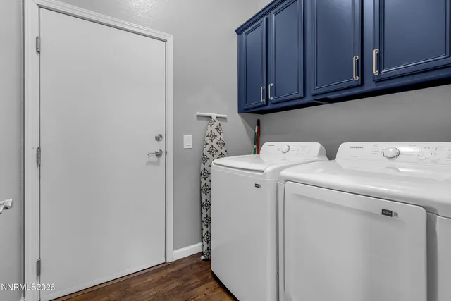 a view of walk in closet with clothes