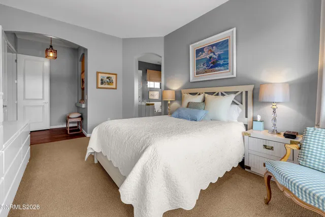 a view of a living room filled with furniture