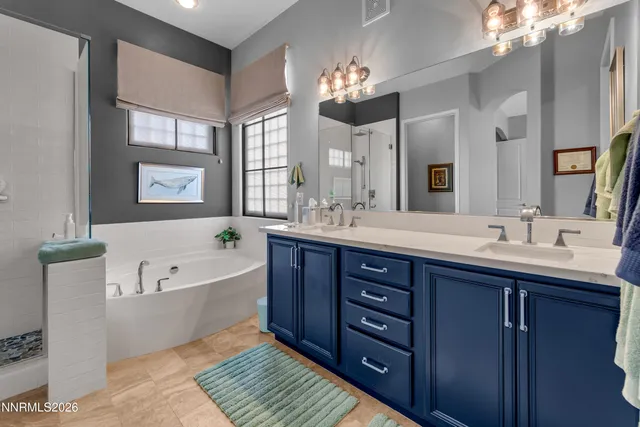 an aerial view of a house with swimming pool