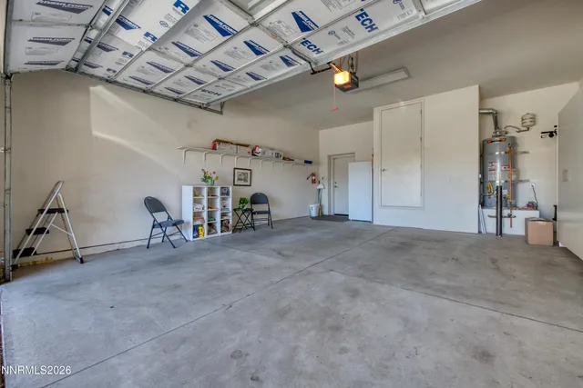 a view of a backyard of the house