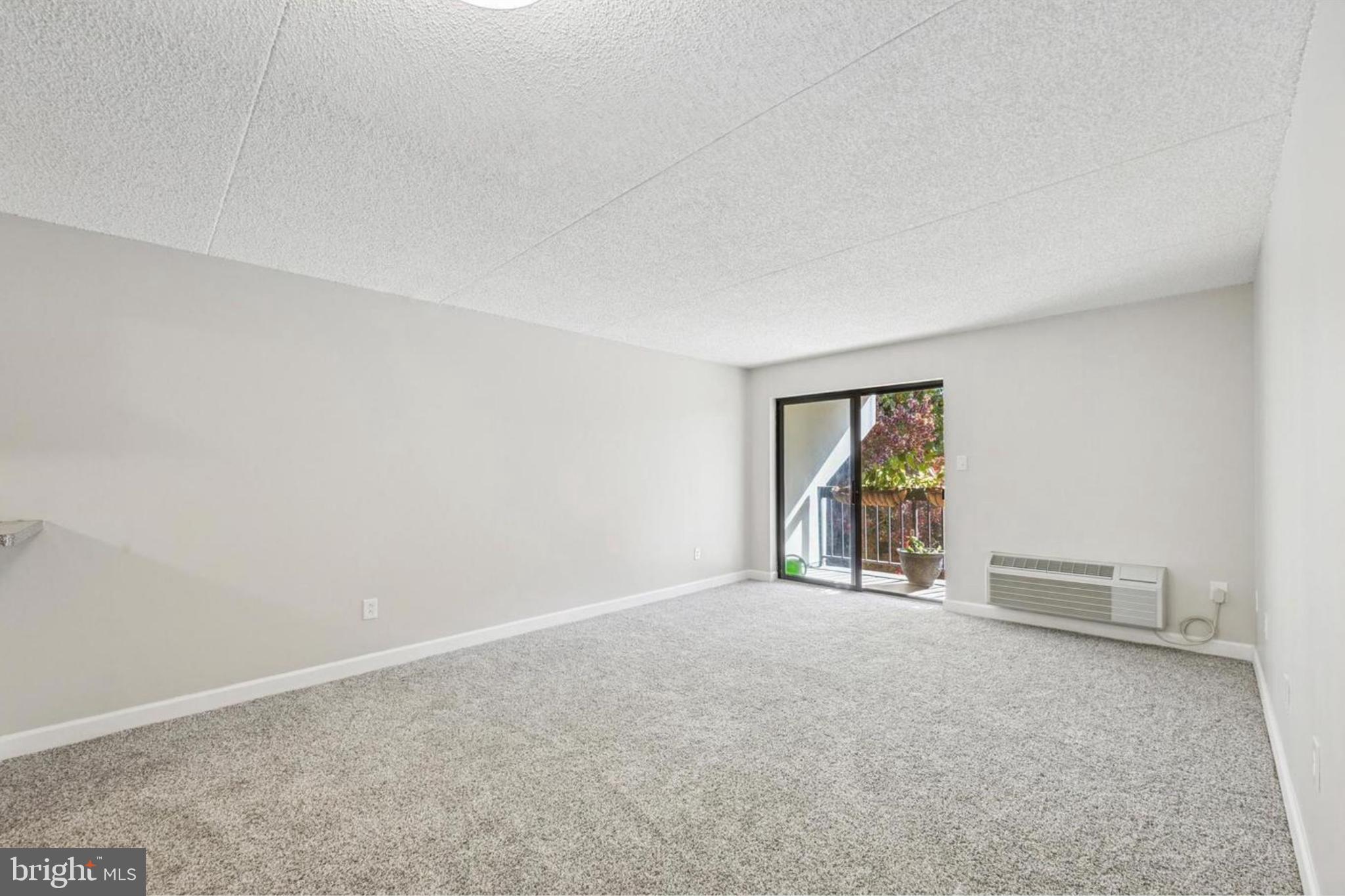 800 Avondale Road, Unit 7B Wallingford, PA 19086 - Photo 4 of 24 an empty room with windows