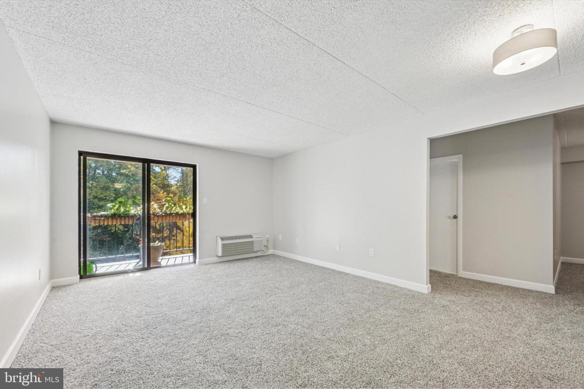800 Avondale Road, Unit 7B Wallingford, PA 19086 - Photo 5 of 24 a view of an empty room with a window