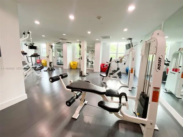 a view of a room with gym equipment