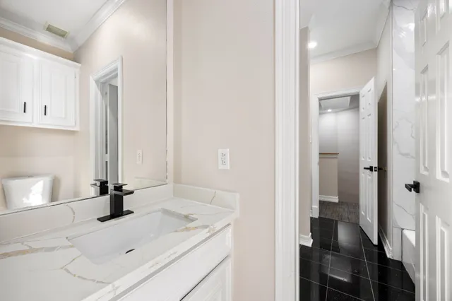 a bathroom with bathtub and shower