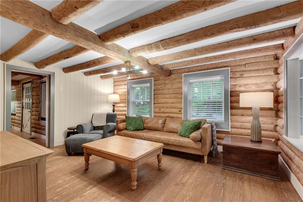 3582 Casteel Road Marietta, GA 30062 - Photo 11 of 55 a living room with furniture and a wooden floor