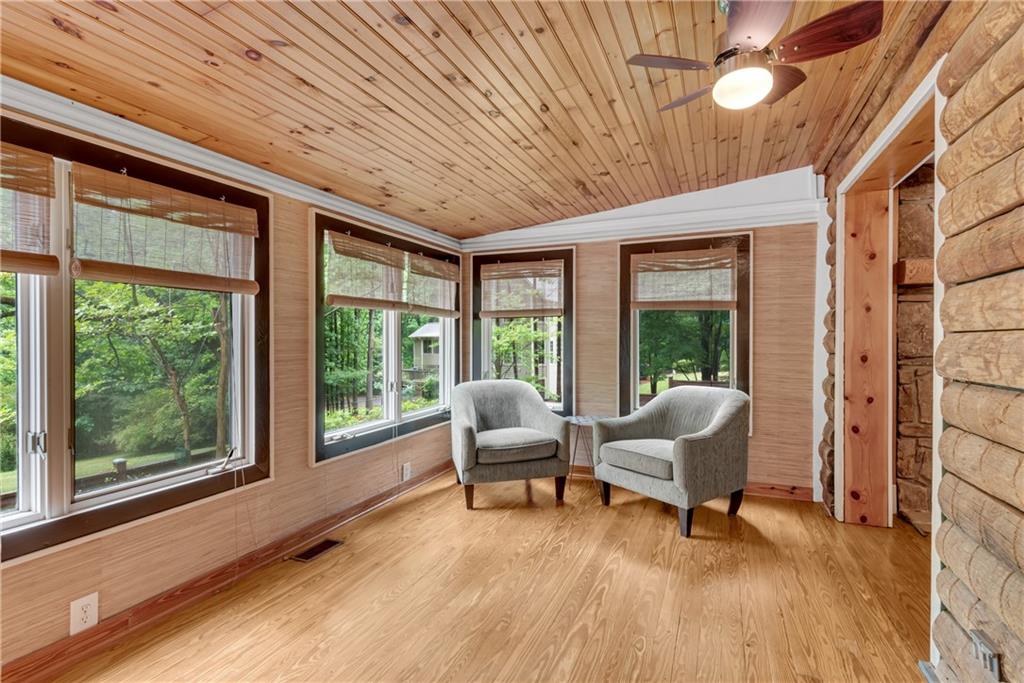 3582 Casteel Road Marietta, GA 30062 - Photo 16 of 55 a living room with furniture and a large window