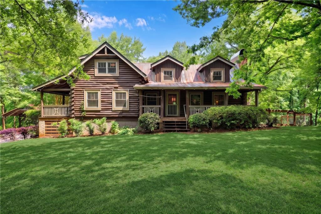 3582 Casteel Road Marietta, GA 30062 - Photo 29 of 55 a front view of a house with a garden