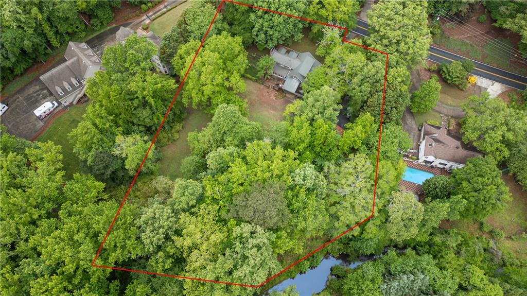 3582 Casteel Road Marietta, GA 30062 - Photo 54 of 55 an aerial view of residential house with outdoor space and trees all around