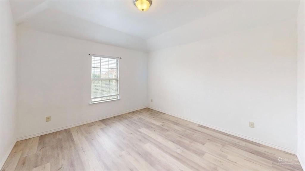 101 Rocky Pine Road McKinney, TX 75072 - Photo 34 of 39 an empty room with windows