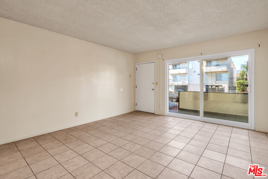 4956 Romaine Street Los Angeles, CA 90029 - Photo 13 of 25 a view of an empty room and window