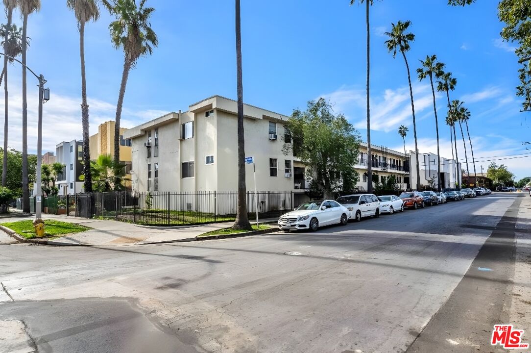 4956 Romaine Street Los Angeles, CA 90029 - Photo 8 of 25 a view of a cars parked in front of a building