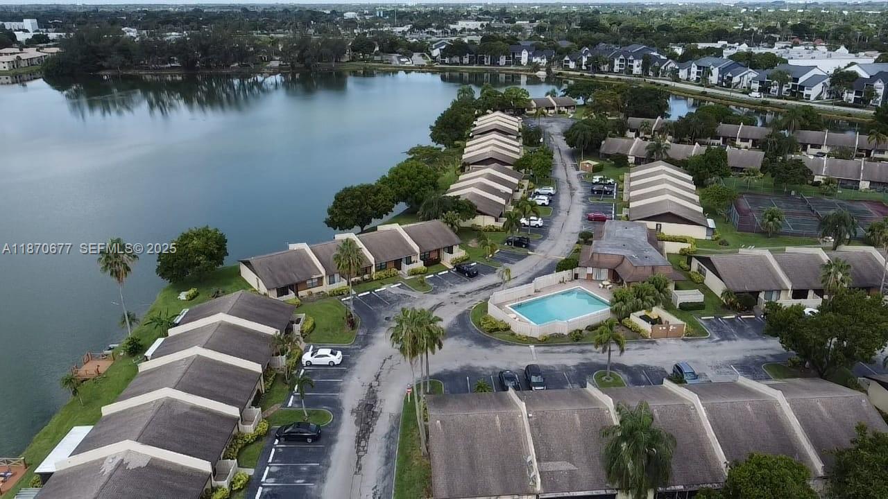 715 Banks Road Margate, FL 33063 - Photo 22 of 24 an aerial view of a house with outdoor space and lake view