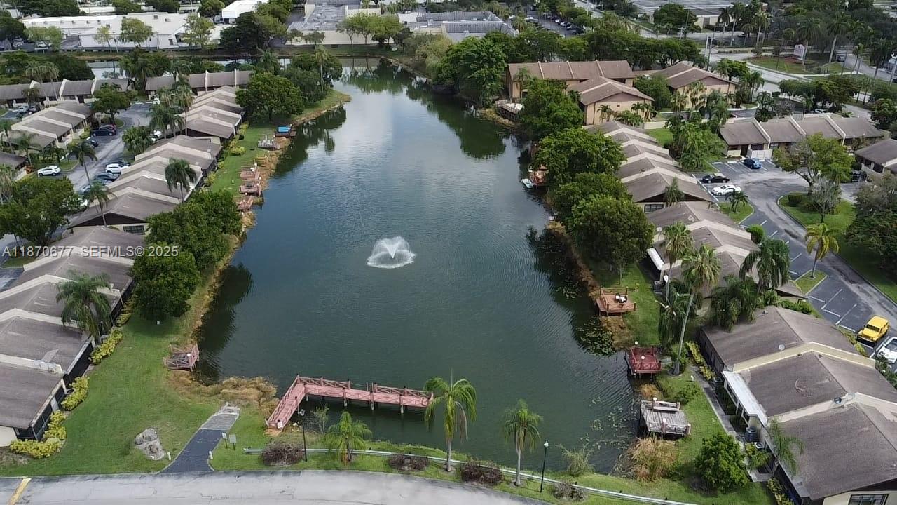 715 Banks Road Margate, FL 33063 - Photo 23 of 24 an aerial view of a house with outdoor space and lake view