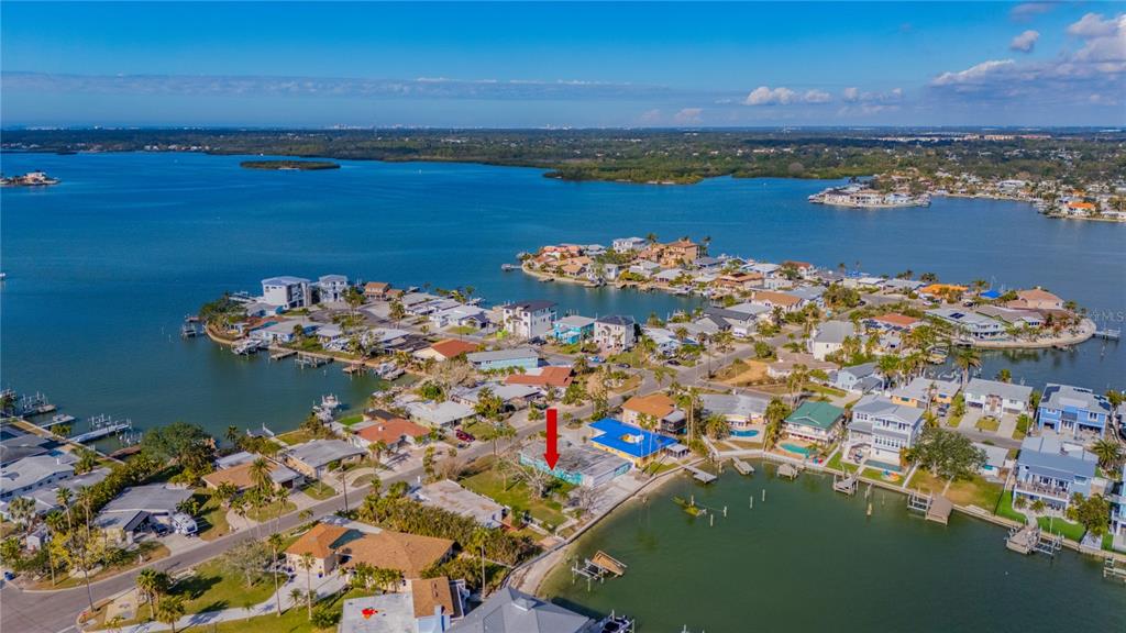 409 161st Avenue Redington Beach, FL 33708 - Photo 12 of 18 an aerial view of a houses with a lake view
