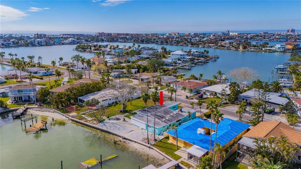 409 161st Avenue Redington Beach, FL 33708 - Photo 15 of 18 an aerial view of a pool patio swimming pool and lake view