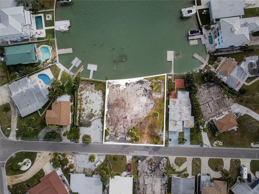 409 161st Avenue Redington Beach, FL 33708 - Photo 3 of 18 an aerial view of a house with a garden