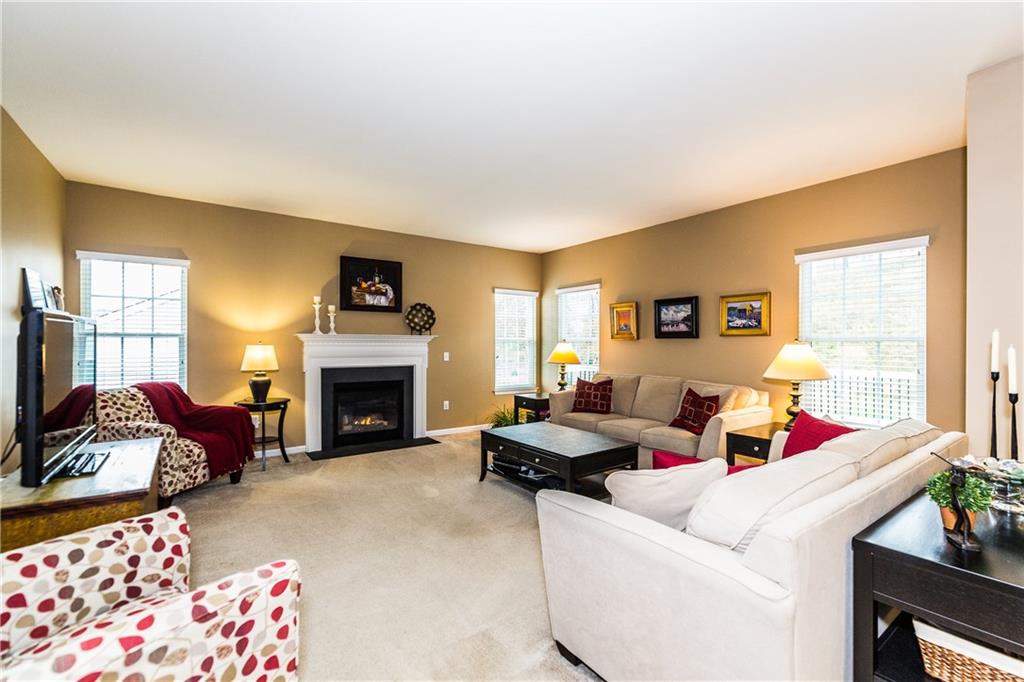 136 Buckingham Drive Pittsburgh, PA 15237 - Photo 5 of 25 The Family Rm offers plenty of Space, Natural Light and a cozy Gas Fireplace for Entertaining or relaxing with the Family