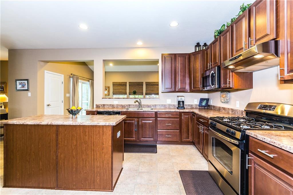 136 Buckingham Drive Pittsburgh, PA 15237 - Photo 9 of 25 Wonderful Kitchen with plenty of space for preparing Family Meals and offers an upgraded SS Hood Vent