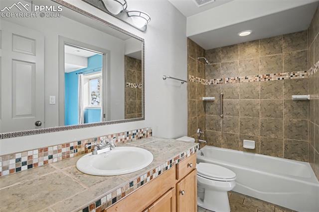 5510 Wilson Road Colorado Springs, CO 80919 - Photo 26 of 44 Adjoining full bathroom in basement.