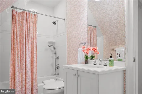 a room that has a table and chairs in it