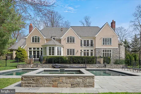 a view of swimming pool with a yard