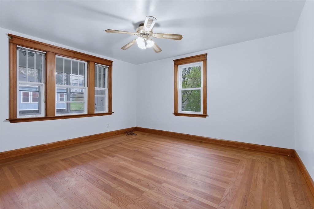 7 3rd Avenue Dudley, MA 01571 - Photo 20 of 42 a view of an empty room with windows