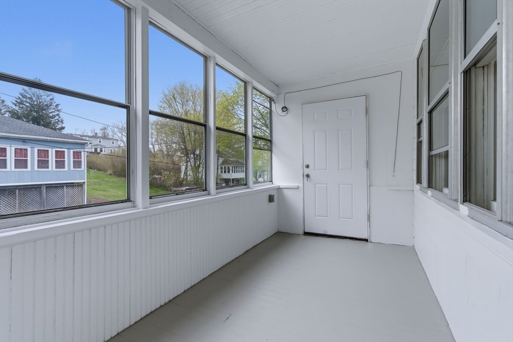 7 3rd Avenue Dudley, MA 01571 - Photo 23 of 42 an empty room with windows
