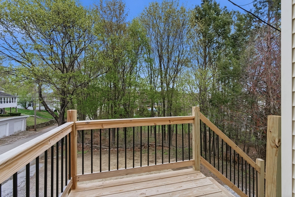 7 3rd Avenue Dudley, MA 01571 - Photo 24 of 42 a view of balcony and deck