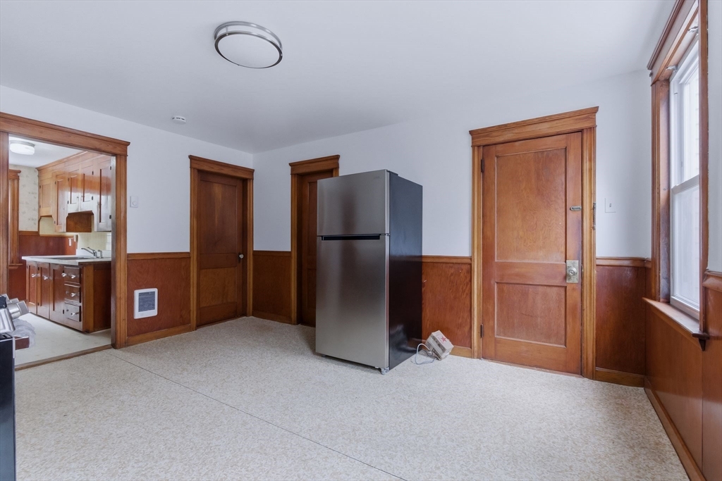 7 3rd Avenue Dudley, MA 01571 - Photo 3 of 42 an empty room with closet and windows