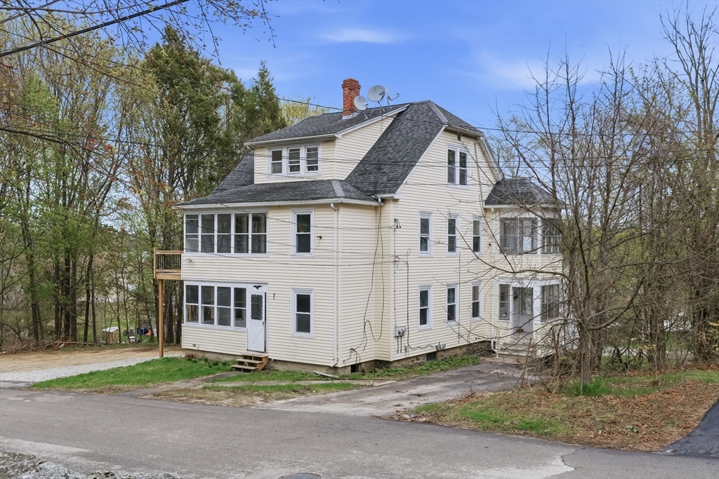 7 3rd Avenue Dudley, MA 01571 - Photo 41 of 42 a house view with a outdoor space