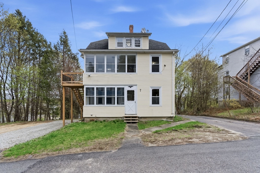7 3rd Avenue Dudley, MA 01571 - Photo 42 of 42 a front view of a house with a garden