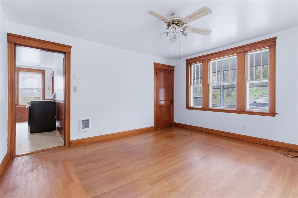 7 3rd Avenue Dudley, MA 01571 - Photo 7 of 42 a view of an empty room with a window