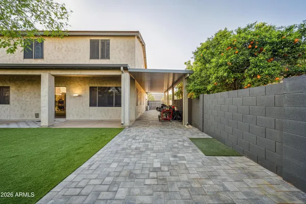 a view of a back yard of the house