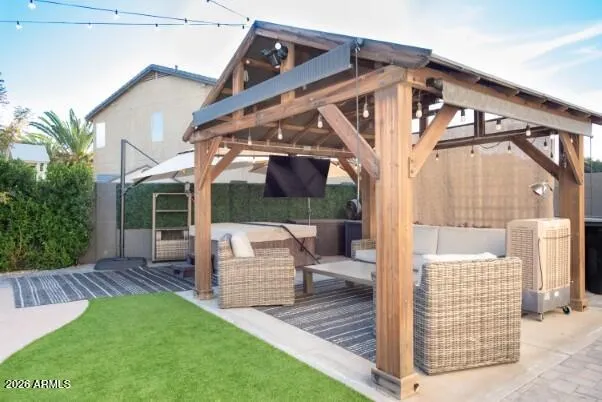 a view of a house with a small yard and plants