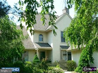 402 Waynesbrooke Road Berwyn, PA 19312 - Photo 1 of 1 a front view of a house with plants