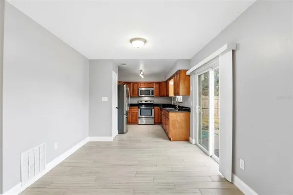 a view of a kitchen with a sink