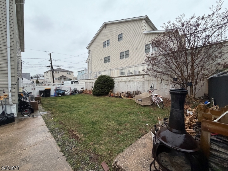 53 Devon Terrace Kearny, NJ 07032 - Photo 2 of 2 a view of a backyard with sitting area