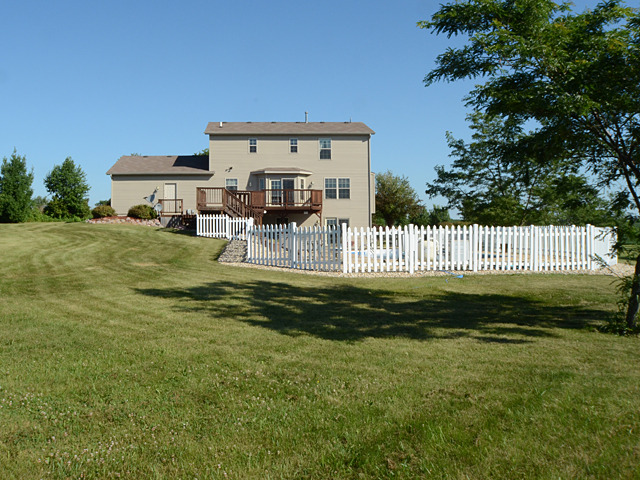 16732 Trask Bridge Road Pecatonica, IL 61063 - Photo 2 of 17 a view of a house with a yard