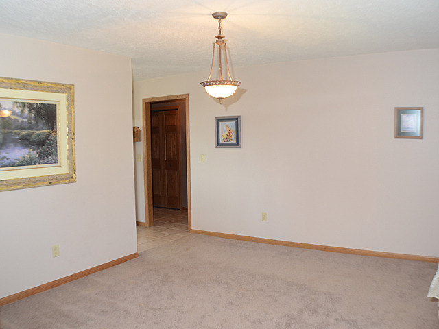 16732 Trask Bridge Road Pecatonica, IL 61063 - Photo 5 of 17 a view of an empty room with a window
