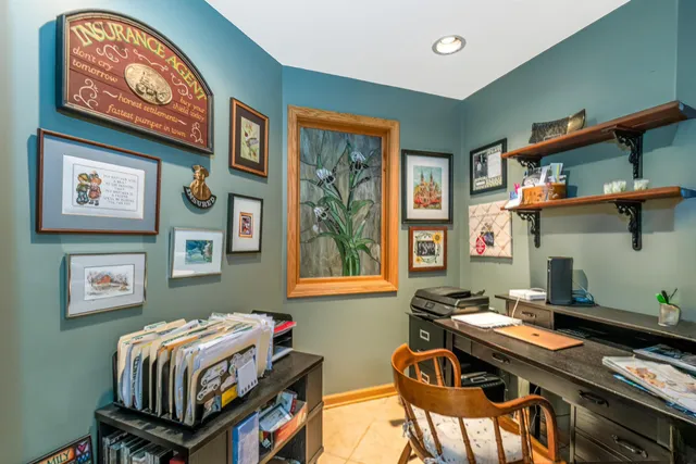 a view of living room with furniture and a fireplace