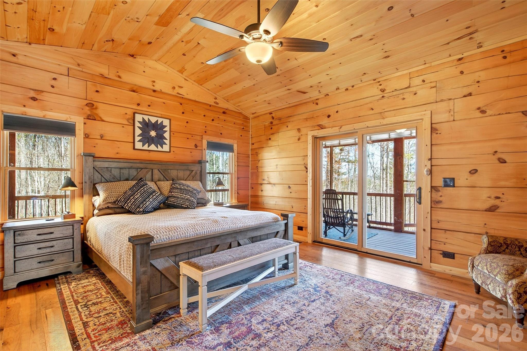 61 Majestic Path Nebo, NC 28761 - Photo 18 of 48 a bedroom with a bed and wooden floor