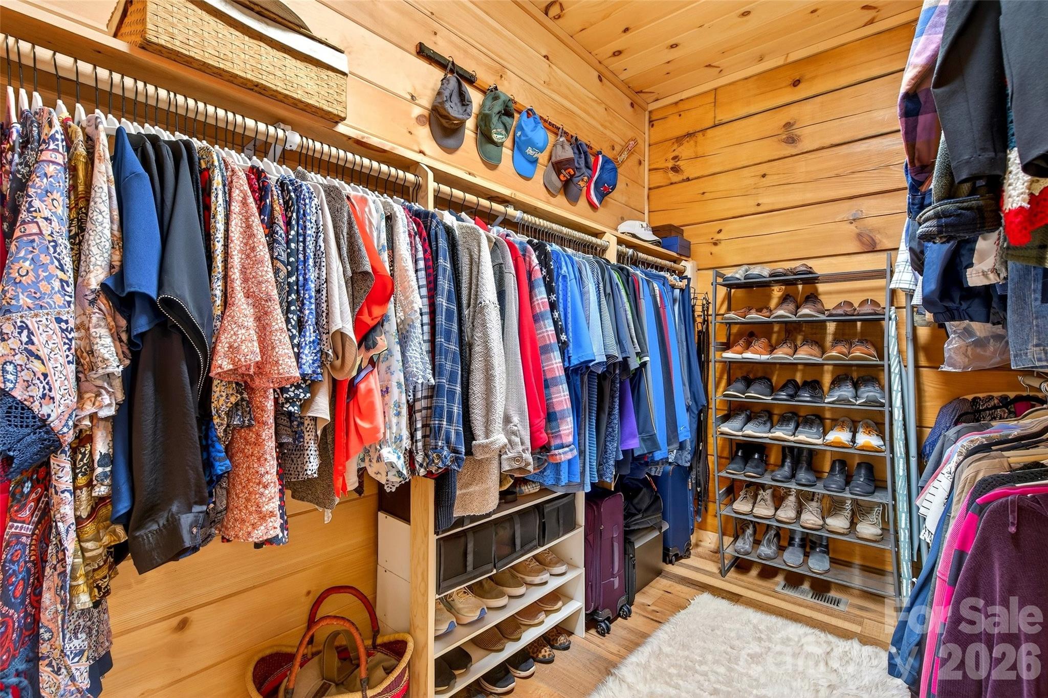 61 Majestic Path Nebo, NC 28761 - Photo 20 of 48 a view of walk in closet with clothes and shoes