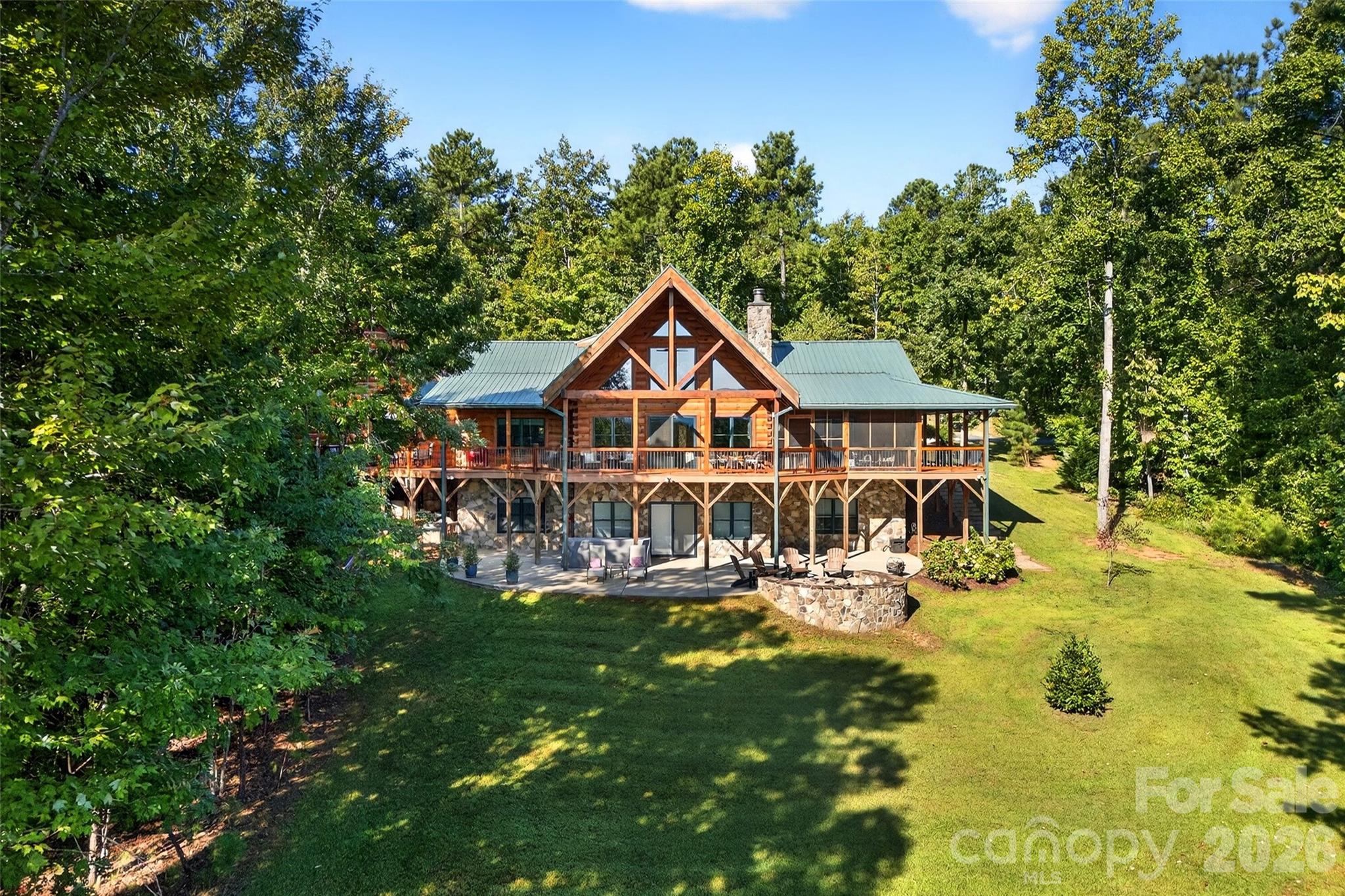 61 Majestic Path Nebo, NC 28761 - Photo 40 of 48 a view of a house with swimming pool and sitting area