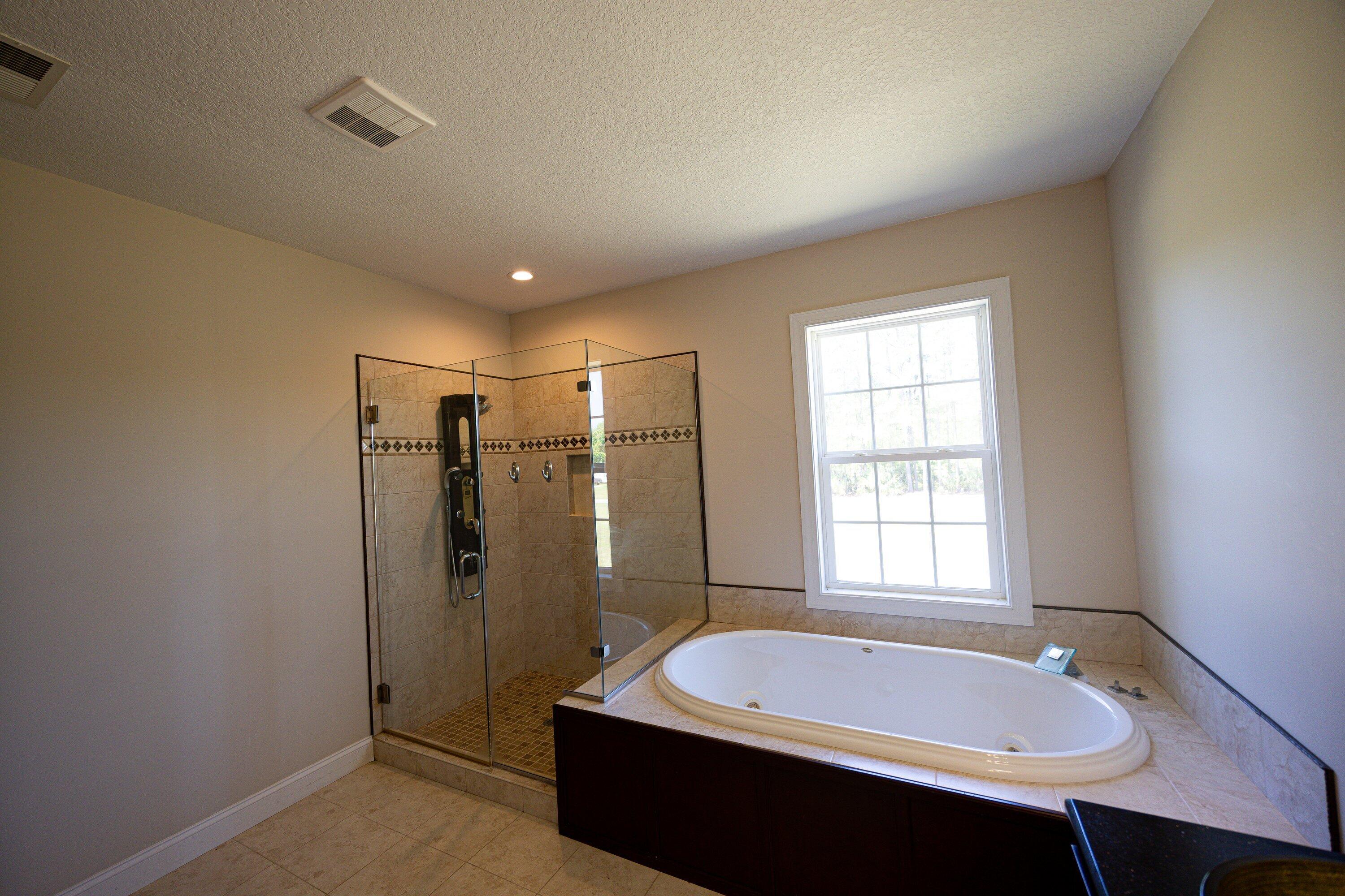 4712 Westervelt Road Meggett, SC 29449 - Photo 17 of 34 23_primary-bathroom_3G4A8236