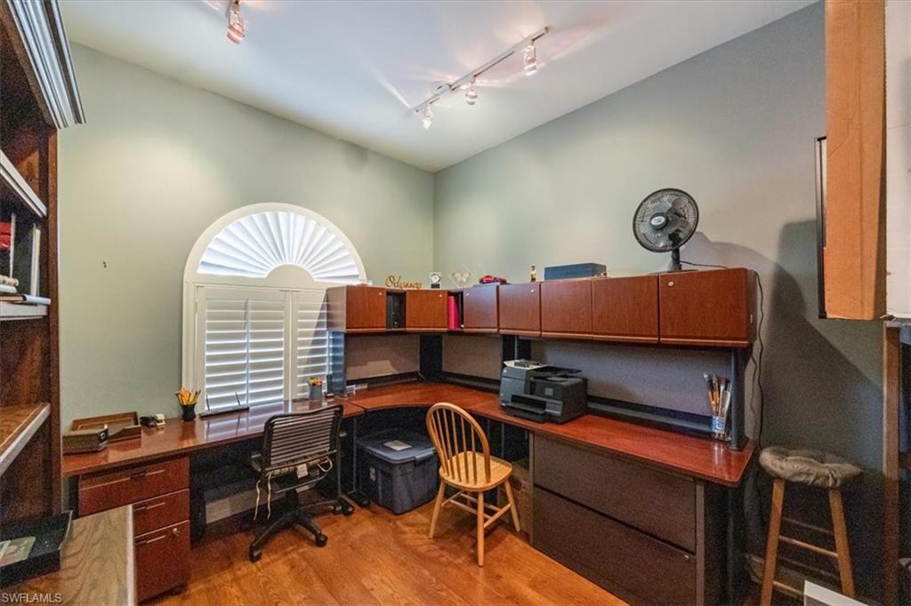 4971 Rustic Oaks Circle Naples, FL 34105 - Photo 35 of 50 a room with furniture and a window