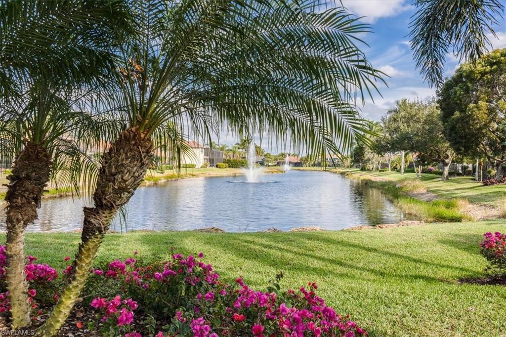 4971 Rustic Oaks Circle Naples, FL 34105 - Photo 48 of 50 a view of a yard with palm trees