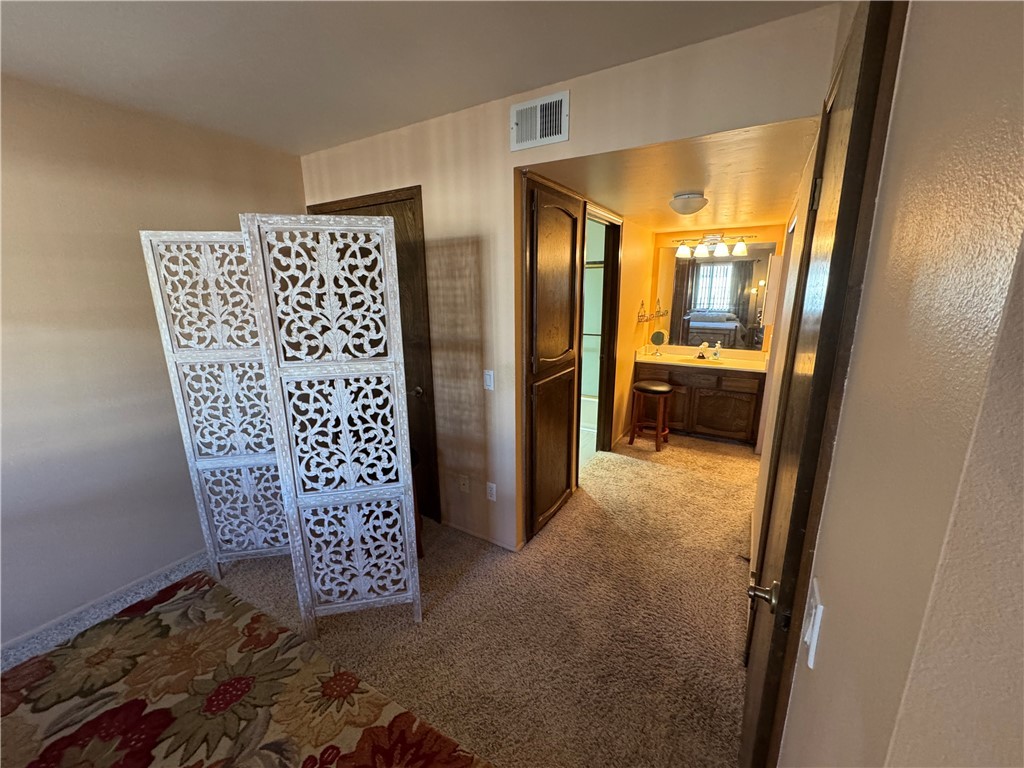 1190 Ramar Road, Unit 15 Bullhead City, AZ 86442 - Photo 12 of 17 Bathroom featuring light carpet